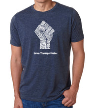 Load image into Gallery viewer, Love Trumps Hate Fist - Men&#39;s Premium Blend Word Art T-Shirt